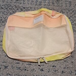 Calpak Peach and Yellow Mesh Cosmetic Bag